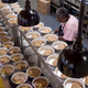 Kitchen staff at Trinity Cafe in Tampa, Florida prepare meatloaf, potatoes and steamed vegetables to be distributed by Feeding America, March 2019